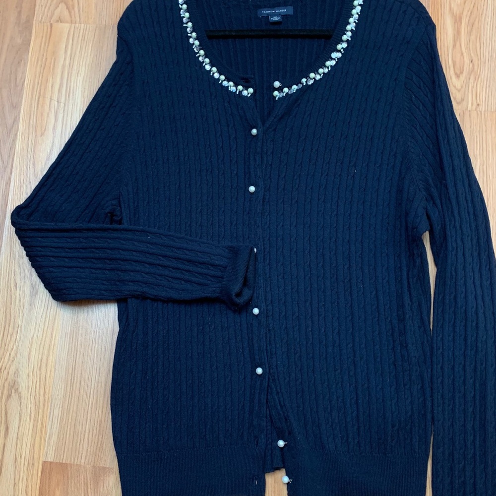 Navy blue cardigan sweater.